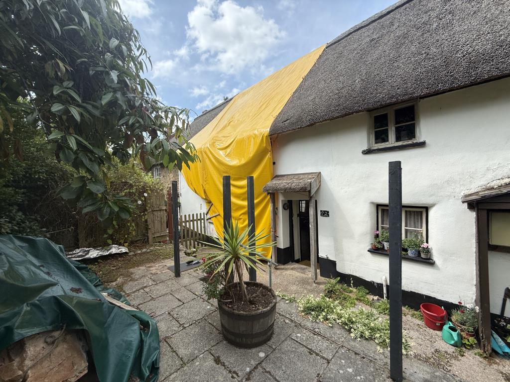 Lot: 133 - CHARACTER COTTAGE FOR REPAIR WITH PARKING - Rear of property where chimney has fallen